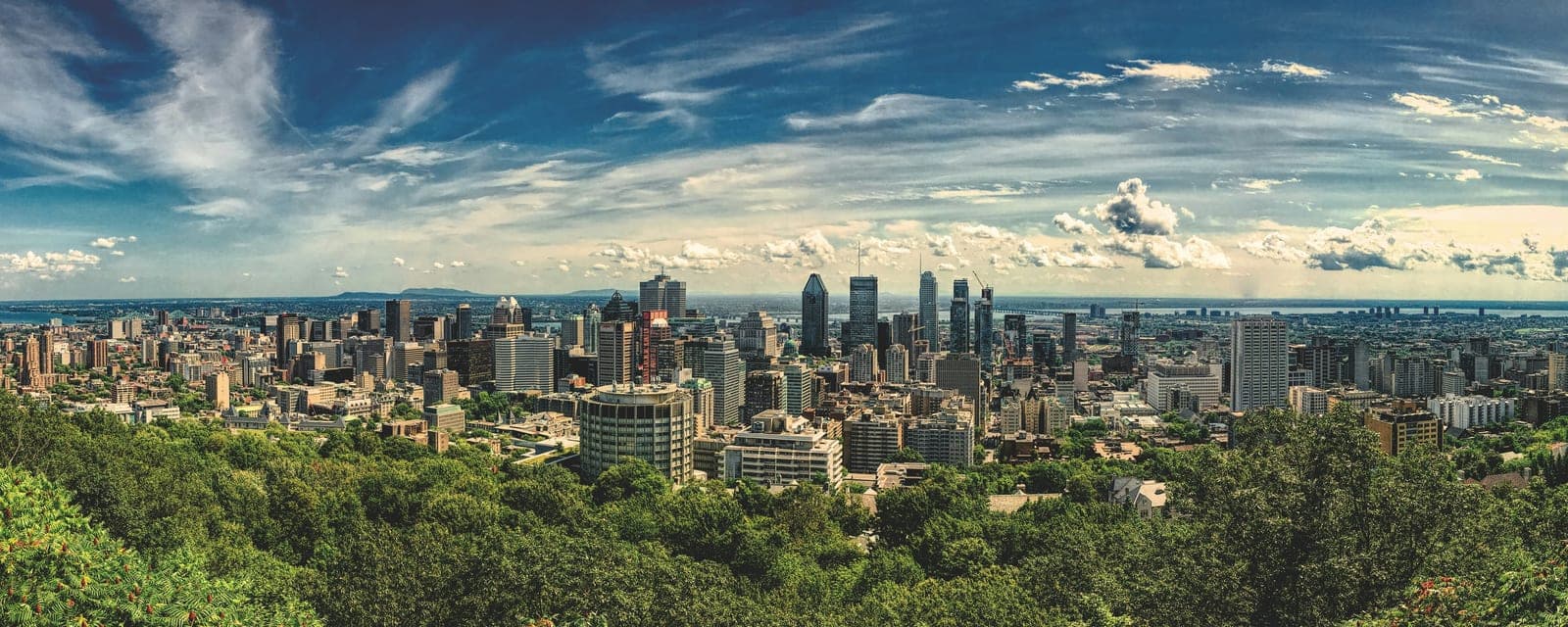 Montreal skyline from Mount Royal with downtown towers and the St. Lawrence River